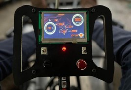 Instrument cluster mounted on the steering wheel during the Gandiva Racing electric go-kart build.