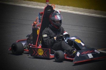 Early electric go-kart running on track.